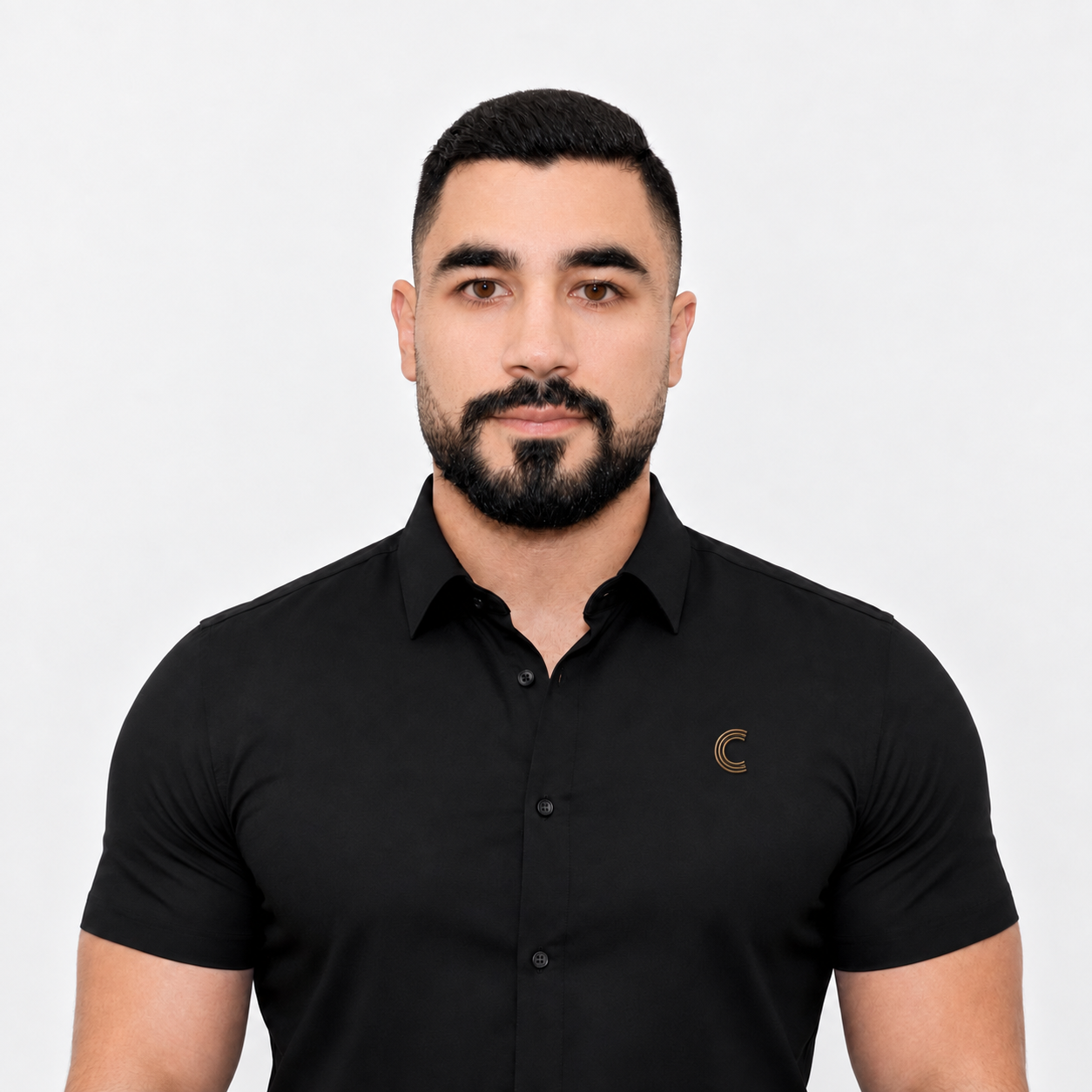Ahmad Dachach modeling the fitted black short-sleeve Cortex shirt concept, edited from his existing Cortex portrait with a bronze C chest detail.